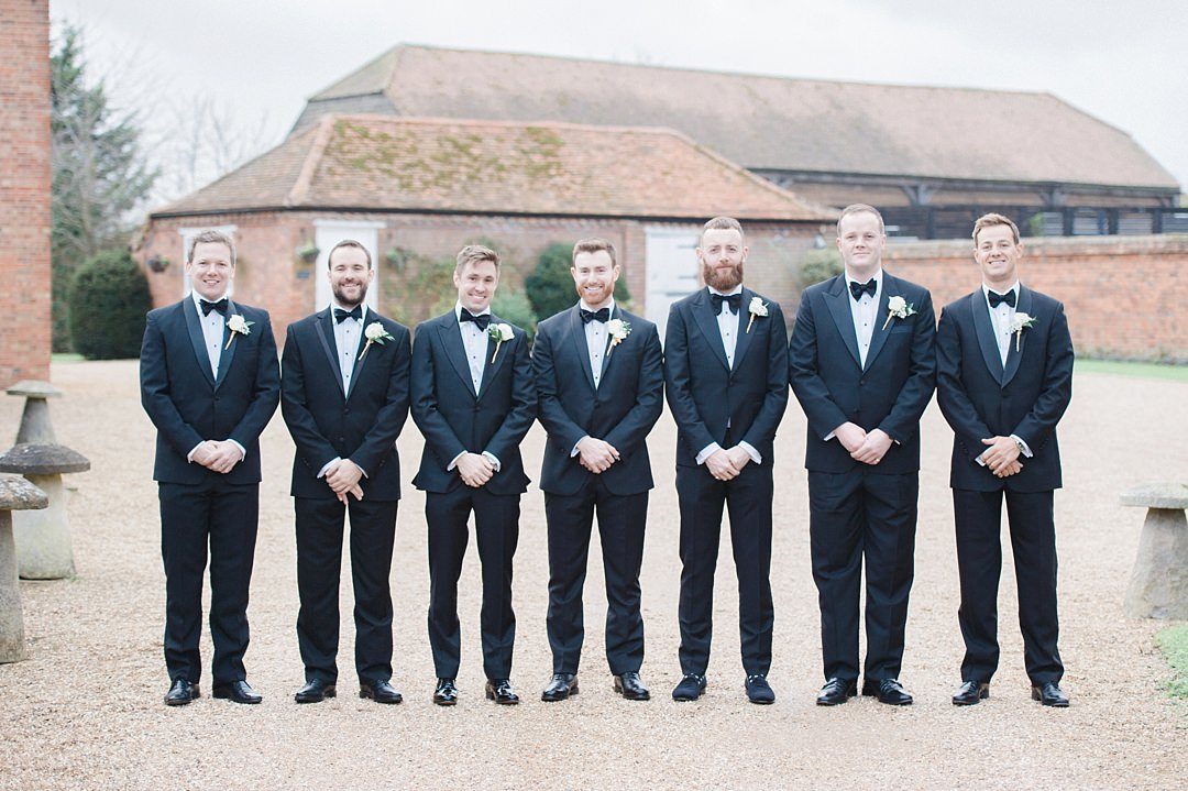 groomsmen in black tie