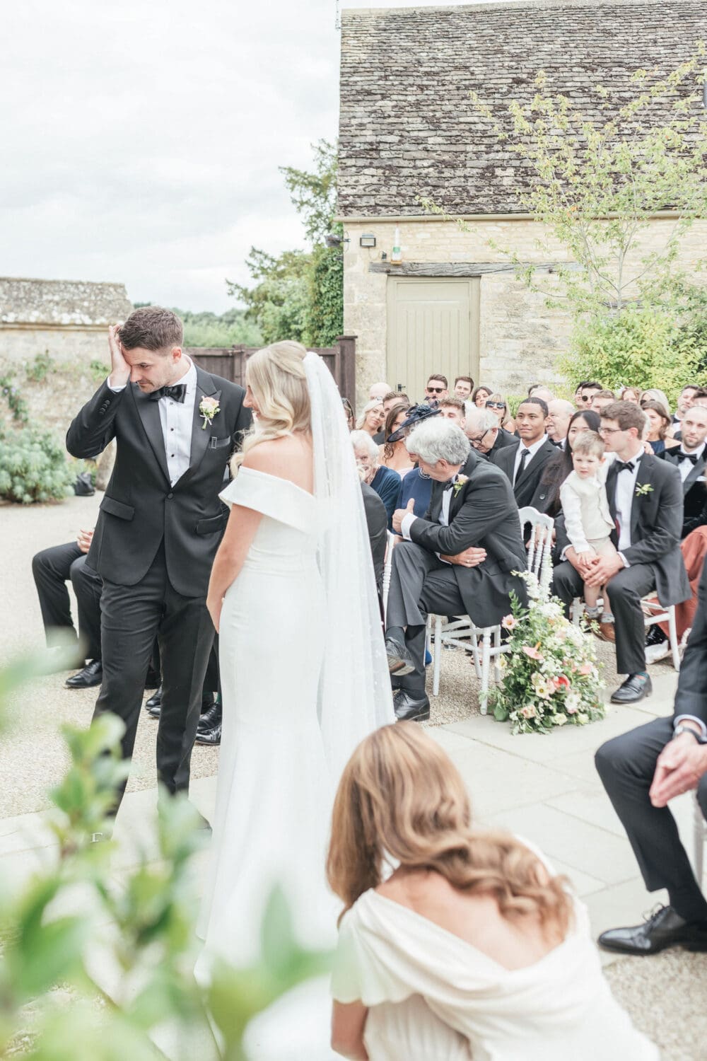 Outdoor ceremony in the walled garden at Caswell House Oxfordshire, summer wedding photography by Hannah McClune Photography